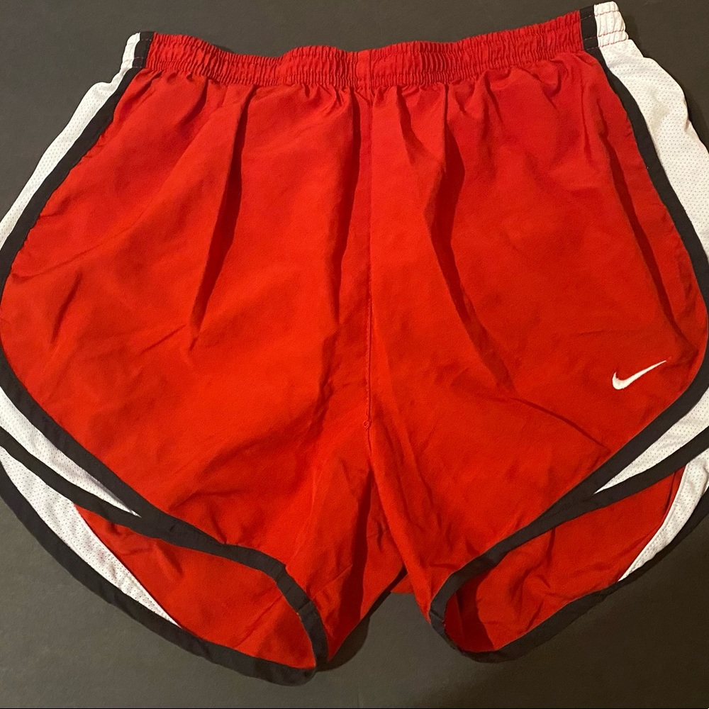 Red Nike shorts